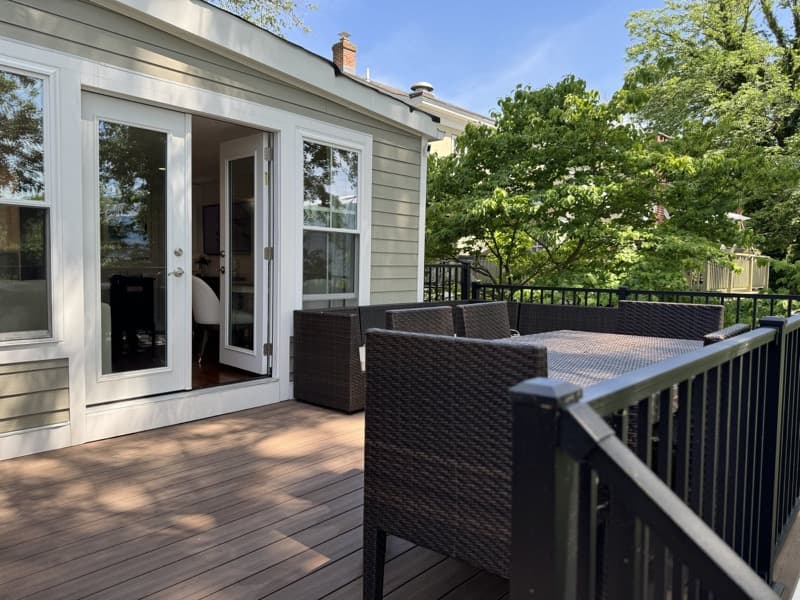 The River Deck — the second-floor wood deck at 13 Lambert Lane, set above the Delaware River.