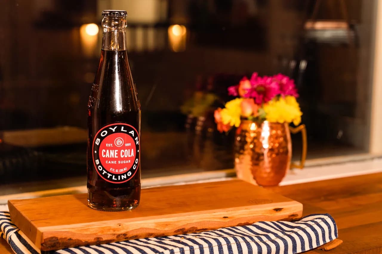 Boylan Cane Cola in a clear glass bottle.