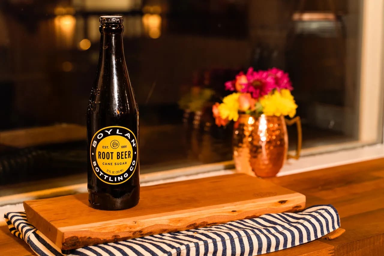 Boylan Root Beer in a glass bottle with the black-and-yellow label.